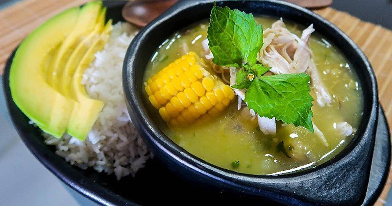 Ajiaco - Source: WikiCommons -</p>
<p>A bowl with Ajiaco, a delicious soup from Colombia made of corn, guascha herbs and often eaten with avocado.</p>
<p>Best Country To Visit In South America